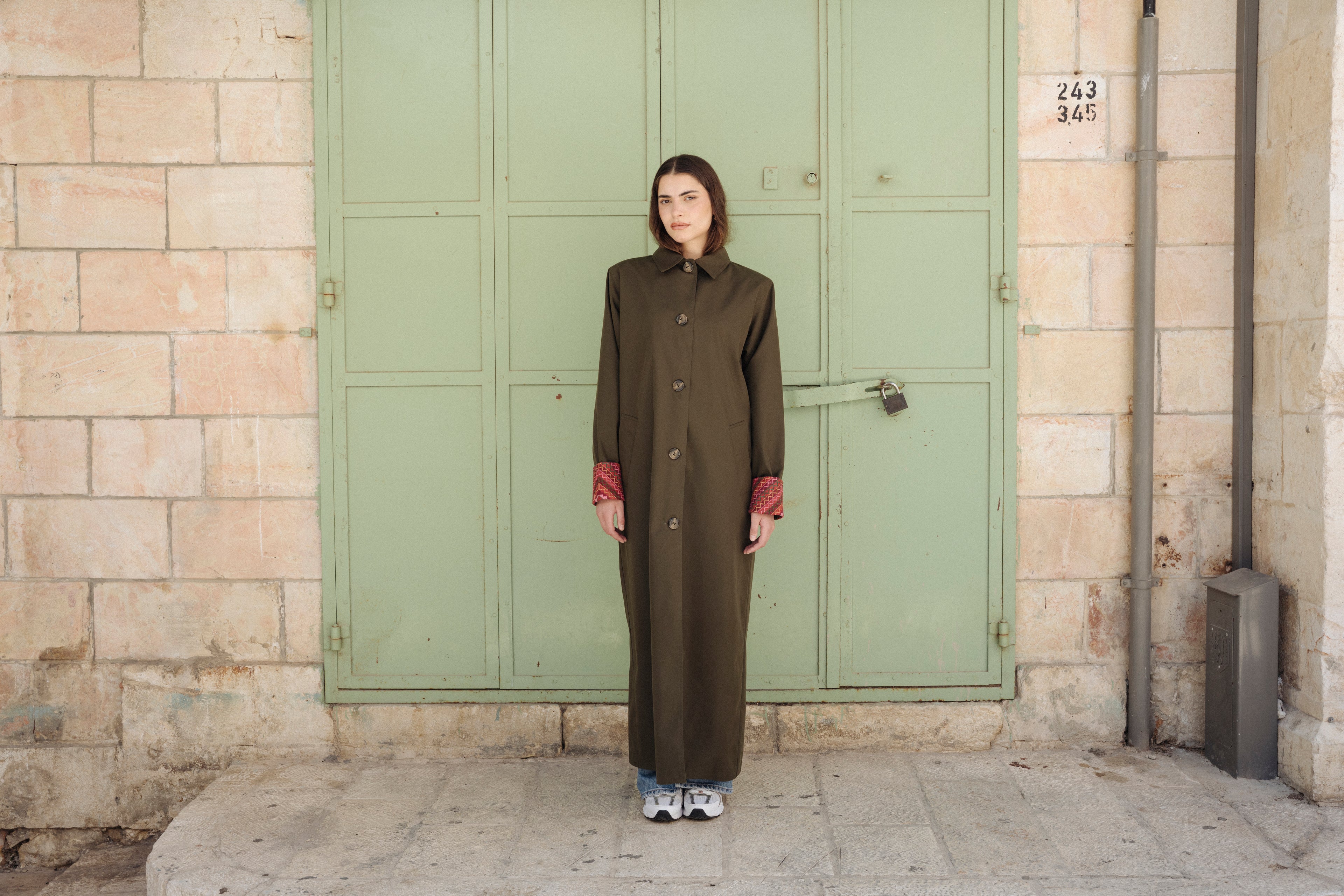 cotton trench coat with hand embroidery on the sleeves